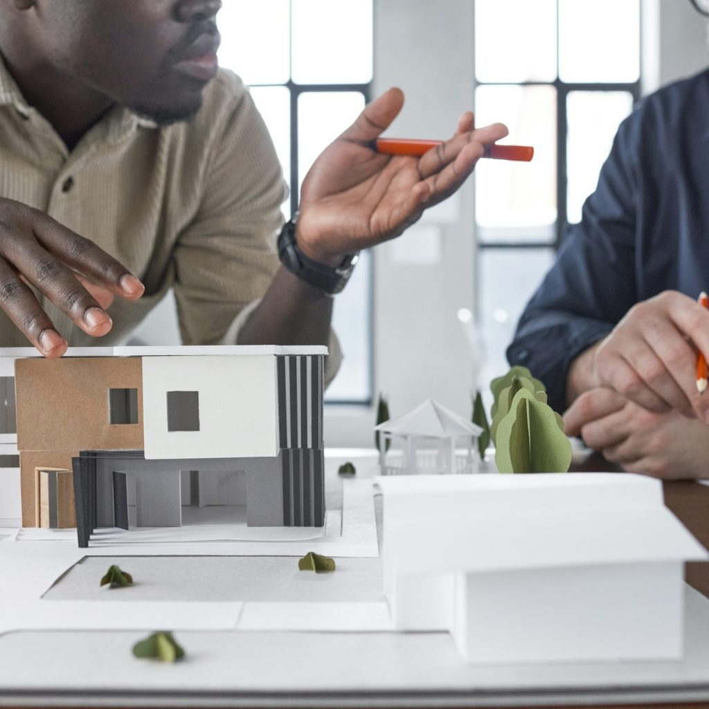 Architect working with construction of building