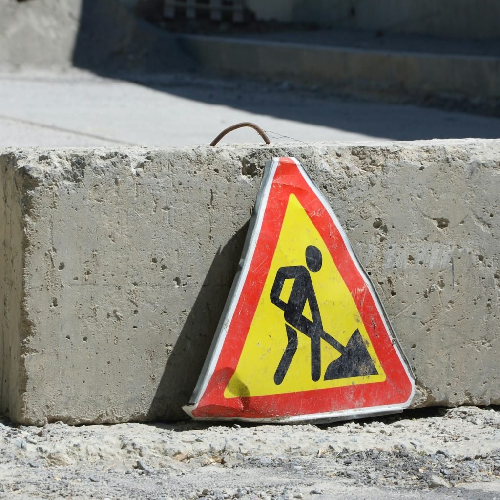 Road works sign for construction works in city street